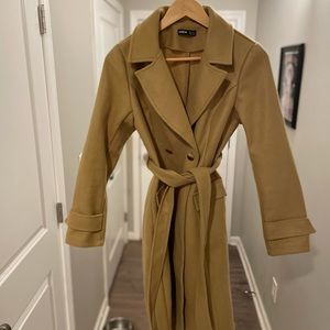 Tan trench coat that ties in front
